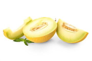 Half of sweet melon with pieces and mint on white background