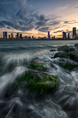 Beautiful view of iconic buildings during sunset with seascape.
