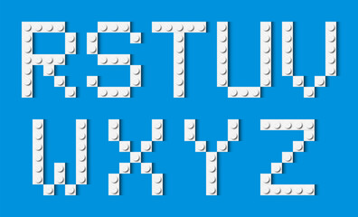 Letters of the alphabet composed of white plastic brick toy blocks on blue background. Building bricks font. Vector background illustration