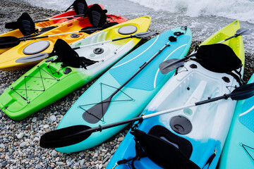 Kayaks and SUP boards on the sea. Extreme sport. Leisure. High quality photo