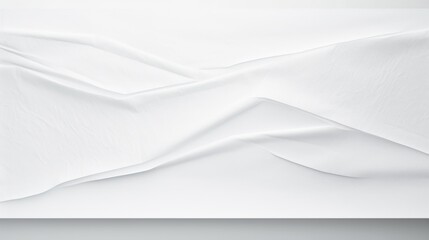 This image showcases a piece of white paper with softly folded and curved lines that create a tranquil and elegant texture, ideal for abstract and minimalist design projects.