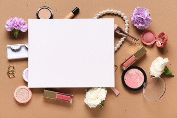 Blank card with makeup products, accessories and flowers on brown background