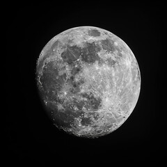 Fototapeta premium A large, full moon is the main focus of this image