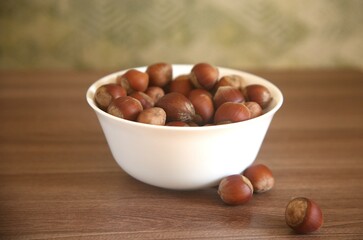 hazelnuts in a white bowl