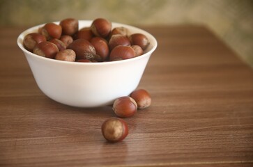 hazelnuts in a white bowl