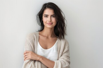Fototapeta premium Satisfied Woman in Chic Cardigan - Lifestyle Portrait - Concept of Contemporary Elegance