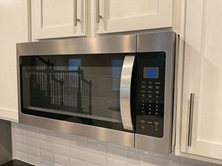modern kitchen microwave built in to cabinet stainless steel appliance 