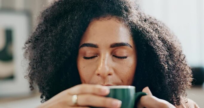Black woman, coffee and aroma with smell in relax on sofa for hot beverage, caffeine or latte at home. African or female person with smile or enjoying morning drink, cappuccino or warm scent at house