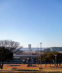 Obraz premium South hotel sector, Brasília shopping mall, Ramada hotel, Nacional hotel and others B Hotel and Brasil 21 shopping center with reflection in the lake in front of the TV tower 