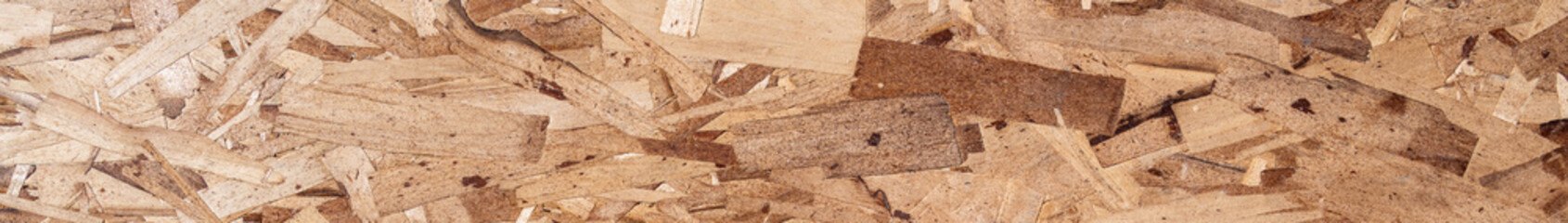 Construction background, texture and pattern in wood oriented strand board, OSP, panel
