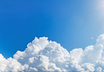 Cumulonimbus clouds floating in the summer blue sky