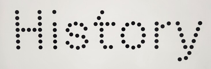 History in black and white background with dots