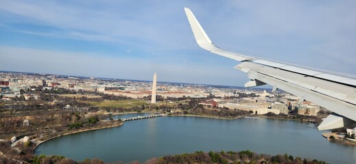 Airline wing with view of Washington DC in the background