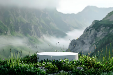 A white round platform sits in a lush green valley with mist-shrouded mountains in the background. Photo perfect for product displays. - obrazy, fototapety, plakaty
