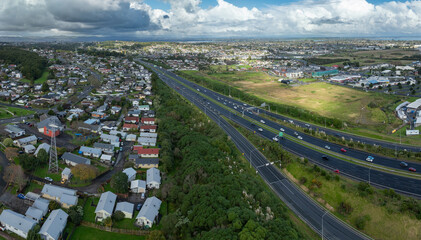 Traffic on State highway 1 motorway and the district of Manukau,, Auckland, New Zealand.