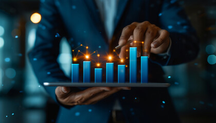 Businessman using tablet to analyze financial data, business growth, data visualization