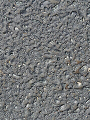 A textural image of an asphalt surface.