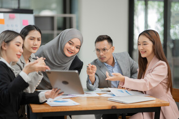 Asian Business Group Chat about graph work Present in meetings, in the office