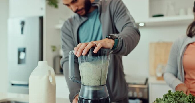 Health, smoothie and couple in kitchen with blender for diet, wellness and detox after workout. Dating, love and man and woman with vegetables or fruit for green juice, protein shake and milkshake