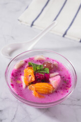 Sop Buah or Es Buah is Mixed Fruit with Coconut or Simple Syrup, Served with Shaved Ice and add Condensed Milk to Add Creamy Sweetened, Popular for Iftar. 
