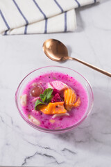 Sop Buah or Es Buah is Mixed Fruit with Coconut or Simple Syrup, Served with Shaved Ice and add Condensed Milk to Add Creamy Sweetened, Popular for Iftar. 