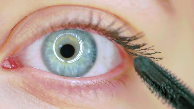 close up video of eyelashes being done with mascara