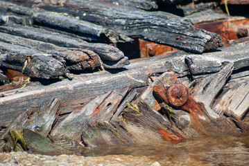 Old rotten logs and rusty bolts.