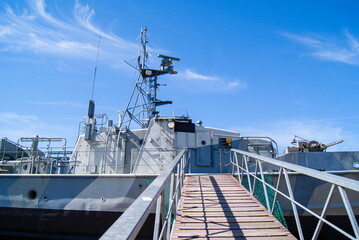 A ladder leading aboard a decommissioned military boat. © Alexey Tikhomirov