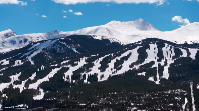 Beautiful drone shot of Breckenridge ski runs in the winter
