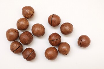 Macadamia nuts on a white background