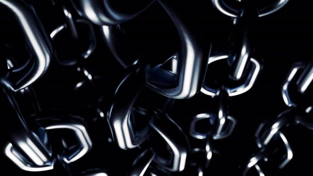 Abstract industrial background with metal large glossy chains hanging isolated on a black background. Design. Silver chains slowly rotating.