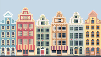 Obraz premium Amsterdam style houses. Silhouette of a row of typical Dutch canal view at Netherlands.