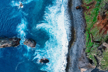 Aerial view of Ribeira da Janela beach with rock Ilheu Grande ,  Madeira Island, Portugal
