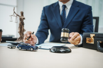 A man in a suit sells cars at his desk, offers online car insurance , car loans, comprehensive coverage, cash withdrawals via credit cards, and provides free legal consultations on automotive issues