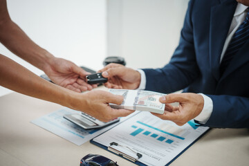 A man in a suit sells cars at his desk, offers online car insurance , car loans, comprehensive coverage, cash withdrawals via credit cards, and provides free legal consultations on automotive issues