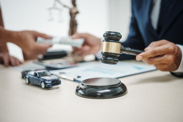 A man in a suit sells cars at his desk, offers online car insurance , car loans, comprehensive coverage, cash withdrawals via credit cards, and provides free legal consultations on automotive issues