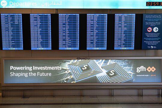 DUBAI, UAE - FEBRUARY 21, 2019: digital flight information display system in Dubai International Airport.