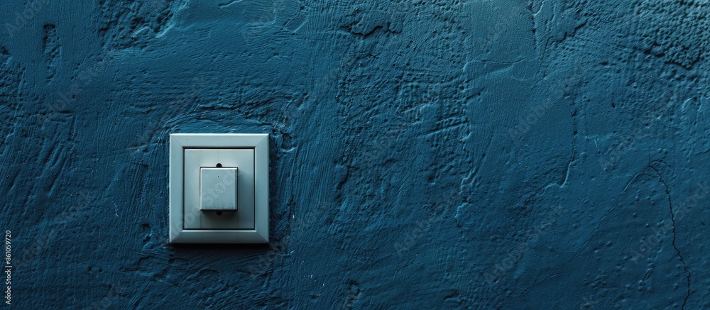 Poster  lighting switch on rough on blue dark wall blank space for text. with copy space image. Place for adding text or design