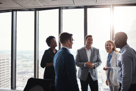 Meeting, discussion and business people in office for teamwork with company budget, revenue or profit. Conversation, collaboration and financial advisors group with corporate stock investment plan.