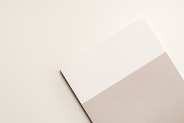 Stack of blank paper on beige background