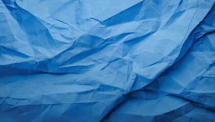 Obraz premium crumpled blue paper texture background
