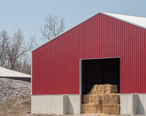 Hay bales inside a shed in the countryside. © Romar66