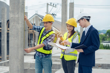 Group architect team on construction site inspection documents and business workflow in the morning.