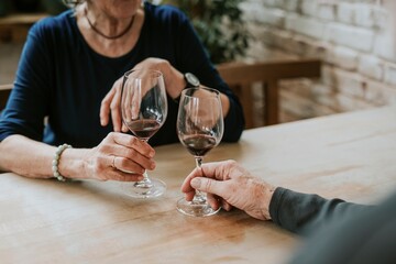 Seniors dating at a wine bar
