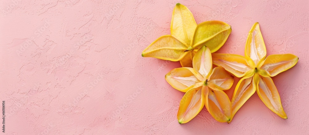 Sticker Carambola  Star fruit Isolated on pastel background. Copy space image. Place for adding text and design