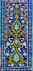 Vertical background with detail of ancient mosaic walls with floral and geometric ornament. Traditional tile decoration on wall, Samarkand, Uzbekistan