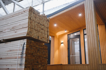 A new wooden modular prefabricated house inside in manufacturing facility