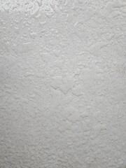 The pattern of water drop on white ceramic tile floor
