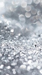 Fototapeta premium Glittering Silver Elegance. Shimmering sparkles on a silver background concept