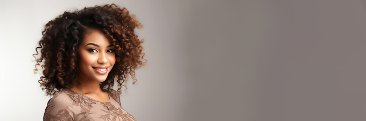 Black African young beautiful woman smiling close up portrait. Cheerful curly face naturally cute country style.